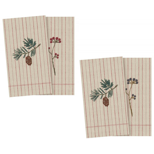 three napkins with embroidered flowers and pine cones