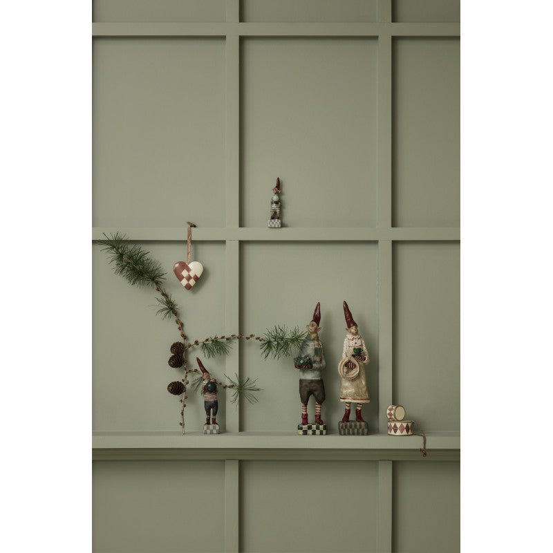 a shelf with ornaments on top of it
